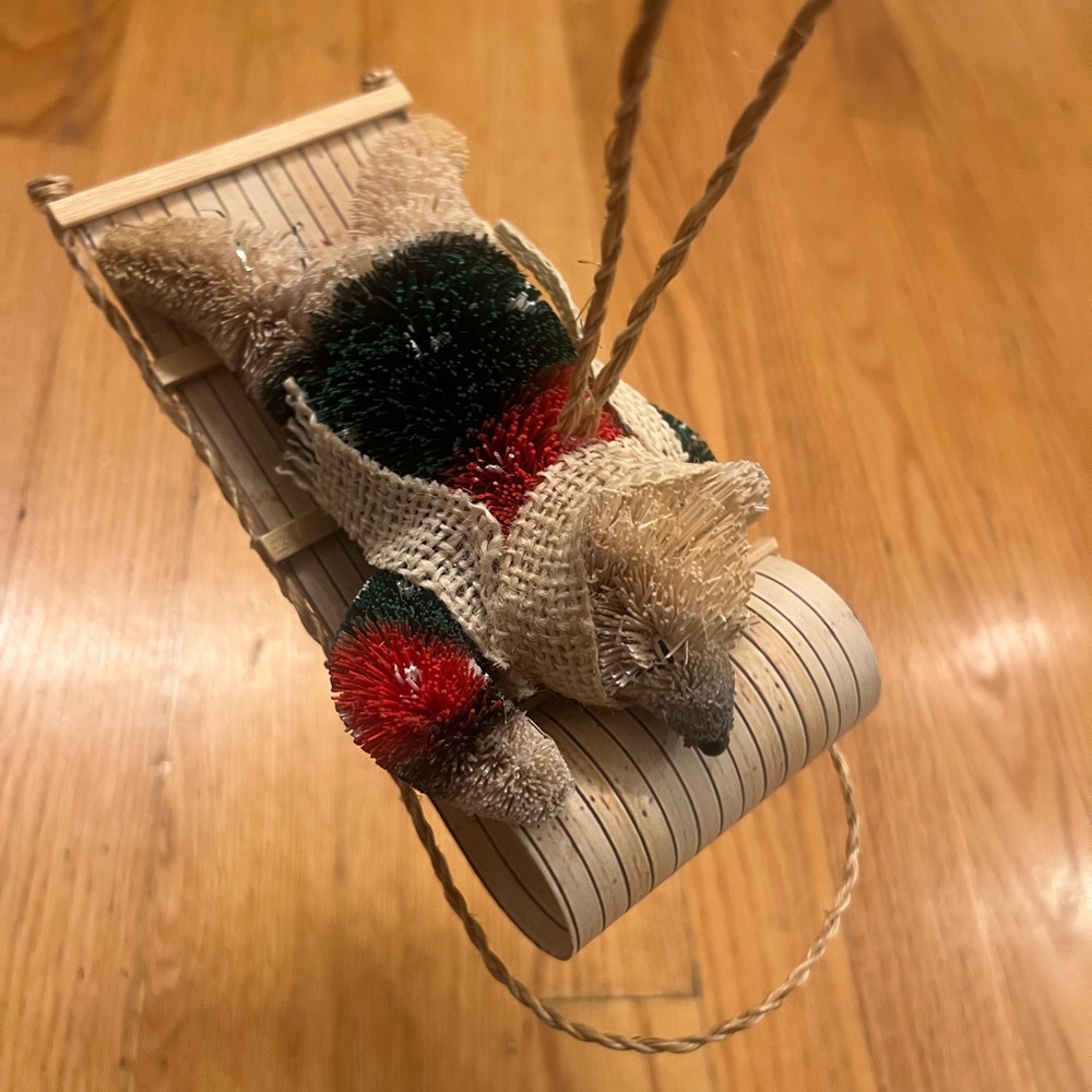 bristle sledding bear Christmas ornament